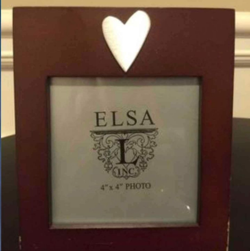 Pretty picture frame with a silver heart by Elsa.